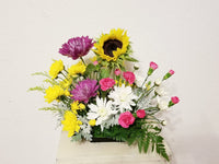 This bright and colorful arrangement is a cheerful combination Spray Carnations, Alstroemeria, Mums, and pink accented with greens. Great for birthday, congratulations or just because.