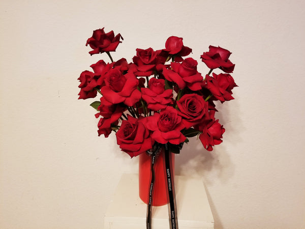 Modern Love Story Arrangement with 20 red roses