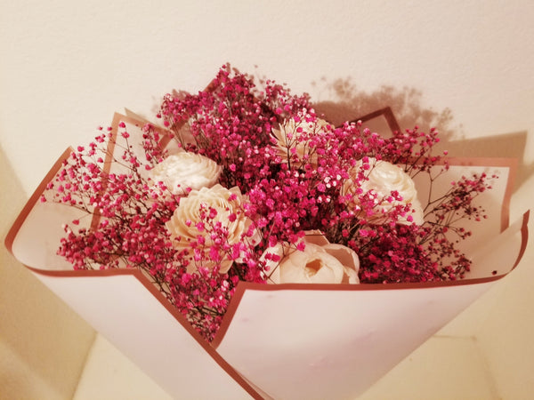 This beautiful bouquet features a lovely blend of Sola Wood Flowers and dried Baby's Breath